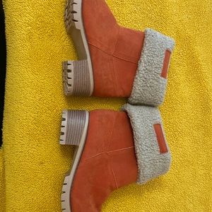 Orange boots. All man made materials. Never worn